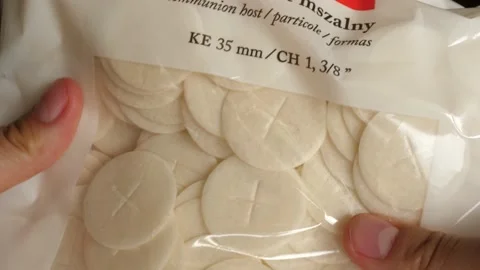 Packaging, bag full of communion host communicants Stock-Footage 136474218