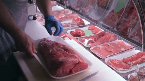 Packaging of beef meat in a butchery Stock Footage 89831454