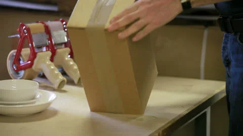 Packaging a box for shipping Видео 24523420