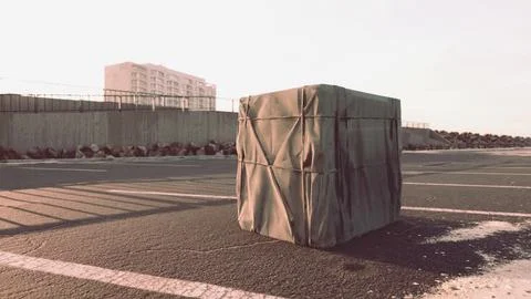 Packaging Boxe Wrapped on empty parking Stock Illustration
