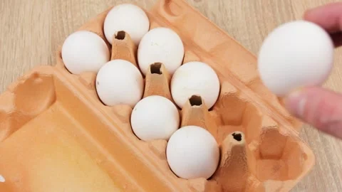 Packaging with chicken eggs. Chicken eggs in a box. Stock Footage 253220358