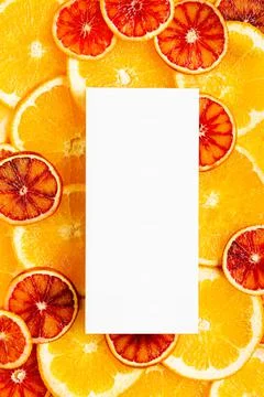 Packaging of chocolate, tea on the orange background. Vertical Stock Photos