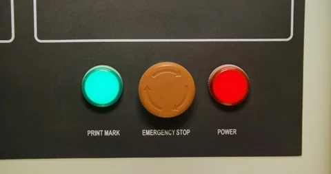 Packaging machine with controls PRINT MARK, EMERGENCY STOP and POWER Stock Footage 125111947