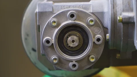 Packaging machine using plastic foil, close up Stock Footage 129876545