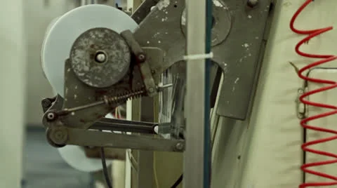 Packaging mechanism on the back of a machine Stock-Footage 25934633