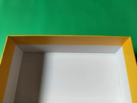 Packaging mockup on a green background. Stock Photos