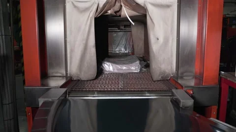 Packaging of newspapers in polyethylene on the machine. Stack rolls along the 動画素材 171444499