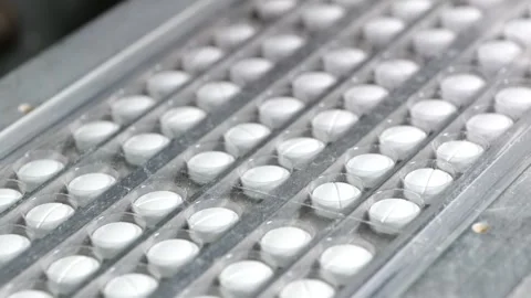 Packaging of pills in blister packs Stock Footage 306596679