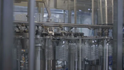 Packaging process of milk production. Plastic bottles transported on conveyor Video stock 106126826