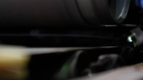 The packaging with the products passes through the sealer. Belt press for sea Stock Footage 172452633