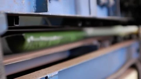 The packaging with the products passes through the sealer. Belt press for sea Stock Footage 172452841