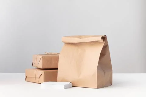 Packaging set of craft boxes and a paper bag Stock Photos