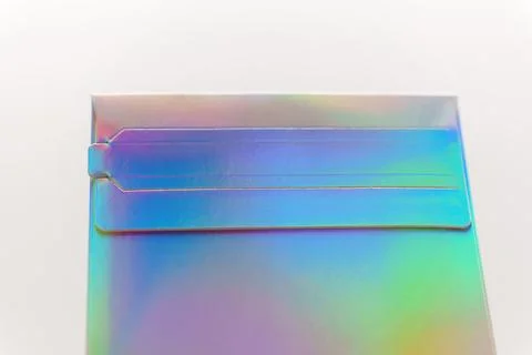 Packaging with shiny surface and tabs for secure closure Stock Photos