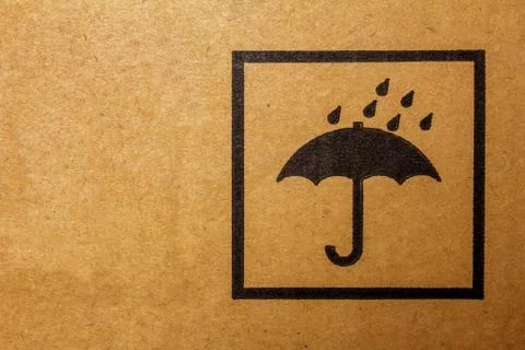 Packaging sign to keep the package away from rain or damp conditions. Stock Photos