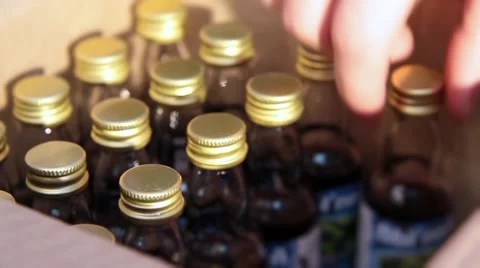 Packaging small bottles Stock-Footage 46910603