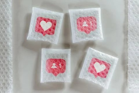 Packaging social icon with bubble wrap Stock Photos