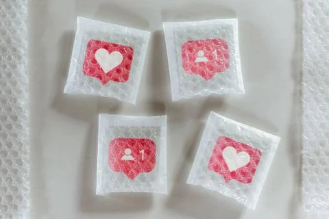 Packaging social icon with bubble wrap Packaging social symbols and icons ... Stock Photos