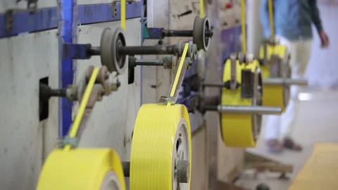 Packaging strap is winding in the four different roles at the same time in the 스톡 동영상 306582075