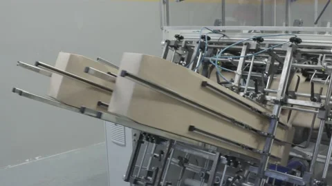 PACKAHING MACHINE MAKING BOXES Vídeo Stock 166685852