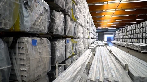 The packed and packaged window profiles warehouse. Departure of the camera Stock Footage 93447892