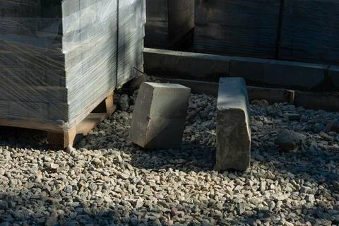 Packed Bricks on Pallet by the Road Stock Photos