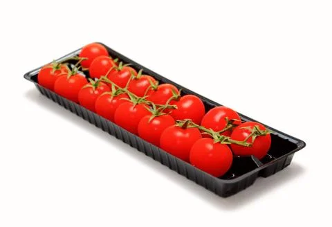 Packed cherry tomatoes Stock Photos