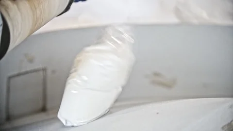 Packed crystal sugar in bag on conveyor belt at the sugar factory Stock Footage 87865846
