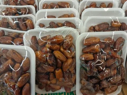 Packed dried dates in plastic Stock Photos