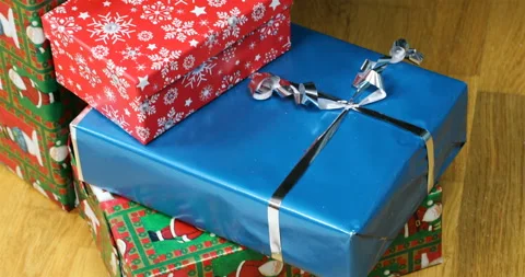 Packed gifts in boxes under the holiday tree Stock Footage 98908205