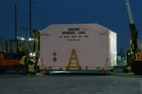 Packed in its shipping container, the spacecraft destined to fly astronaut... Stock Photos