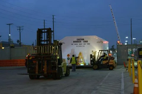 Packed in its shipping container, the spacecraft destined to fly astronaut... Stock Photos