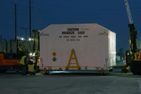 Packed in its shipping container, the spacecraft destined to fly astronauts.. Stock Photos