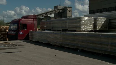 Packed sandwich panels loading outdoor video Stock Footage 88457287