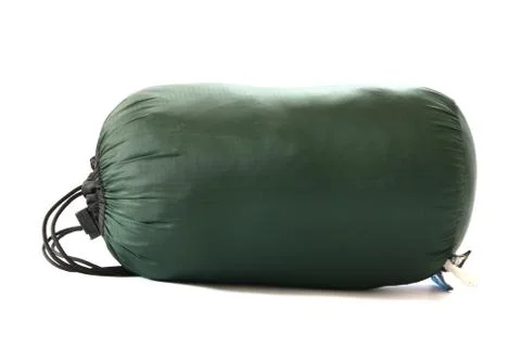 Packed sleeping-bag on white backgrounds Stock Photos