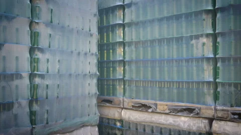 Packed stack of bottles of beer in factory territory Stock Footage 95759124