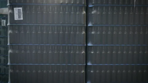 Packed stack of bottles of beer in factory territory Stock Footage 95759199