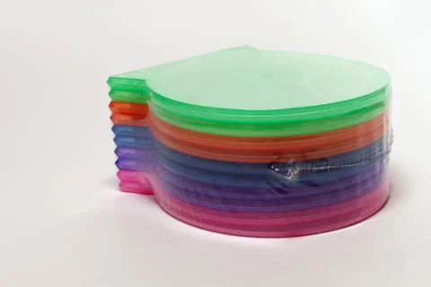 Packed stack of multicolored shells - high quality single case for cd stori.. Stock Photos