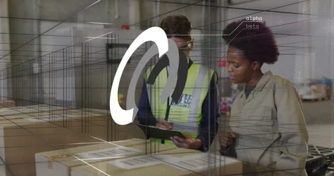 Packer pointing barcode leading coworker writing tablet, confirming shipment as Stock Footage 320915987