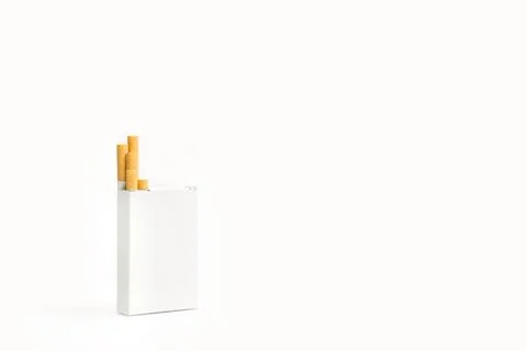 A packet of cigarettes on a white background with copy space Foto stock