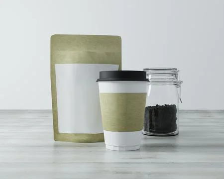 A packet used for coffee with coffee cups. Stock Photos