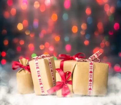 Packets presents christmas background colored lights gift Stock Photos