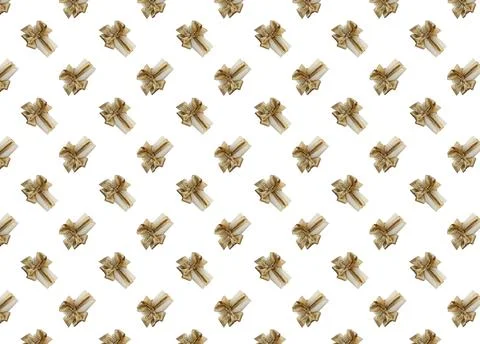 A packing box with a bow on a white background. Photo of a seamless pattern. Stock Photos