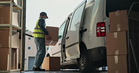 Packing, boxes and delivery man by van for courier service, shipping and 動画素材 346884128