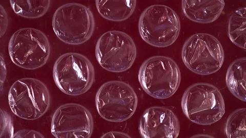 Packing bubble wrap. Slide shot of polyethylene packaging film. Video stock 203822291