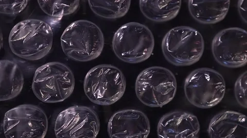 Packing bubble wrap. Slide shot of polyethylene packaging film texture. Slow  Stock Footage 203822428