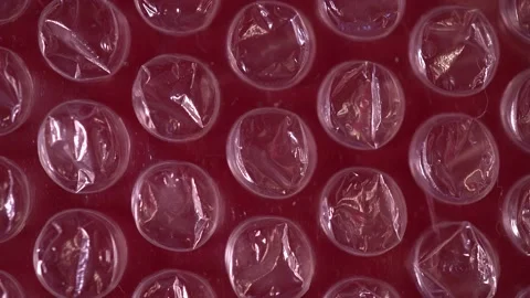 Packing bubble wrap. Slide shot of polyethylene packaging film texture. Slow  Stock Footage 218580009