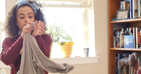 Packing Clothes for the Poor Kindness and Giving Concept Stock Footage 126402449
