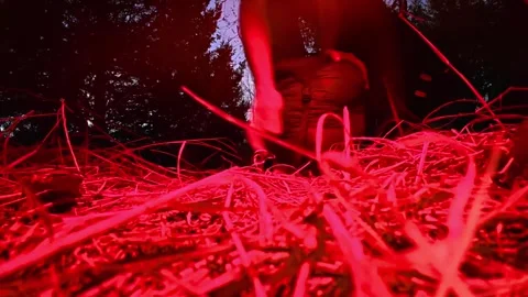 Packing Compression Bag Under Red Light During Early Morning Camp Breakdown 스톡 동영상 337303537