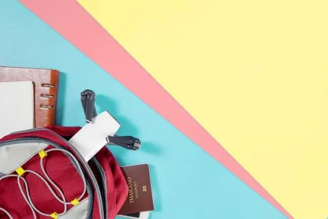 Packing Documents and gadgets for world travel top view flatlay on colorful c Stock Photos
