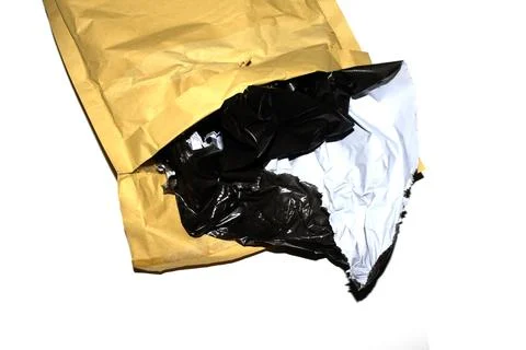 Packing envelope padded mailer bag opened and empty recycling shipping post.. Foto stock